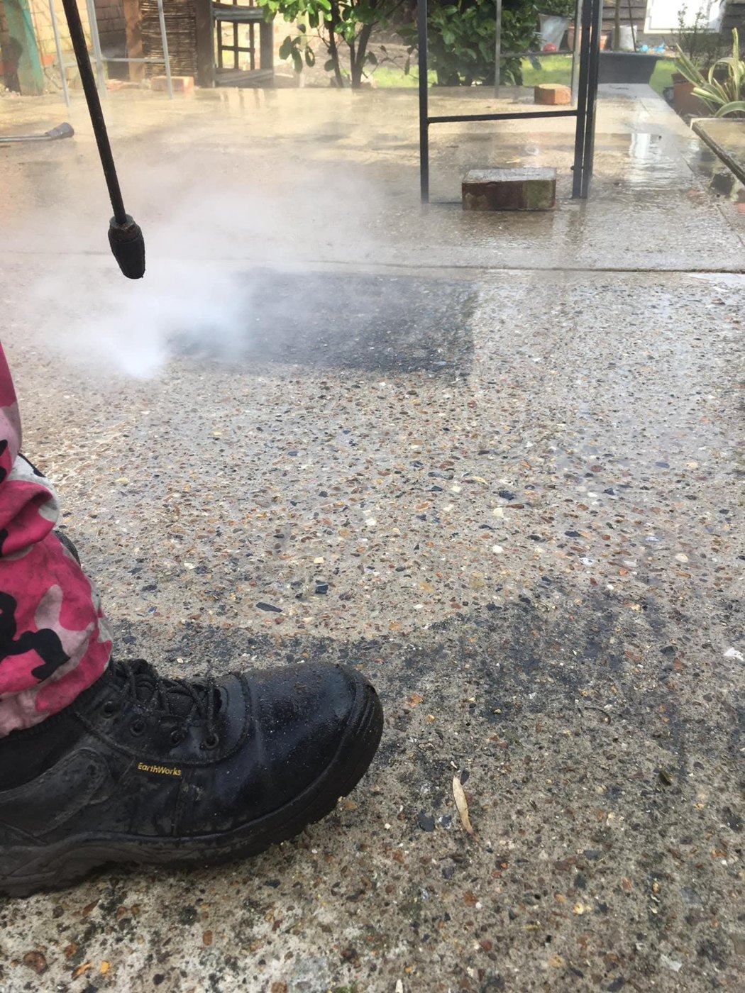 Pressure washing exterior paving