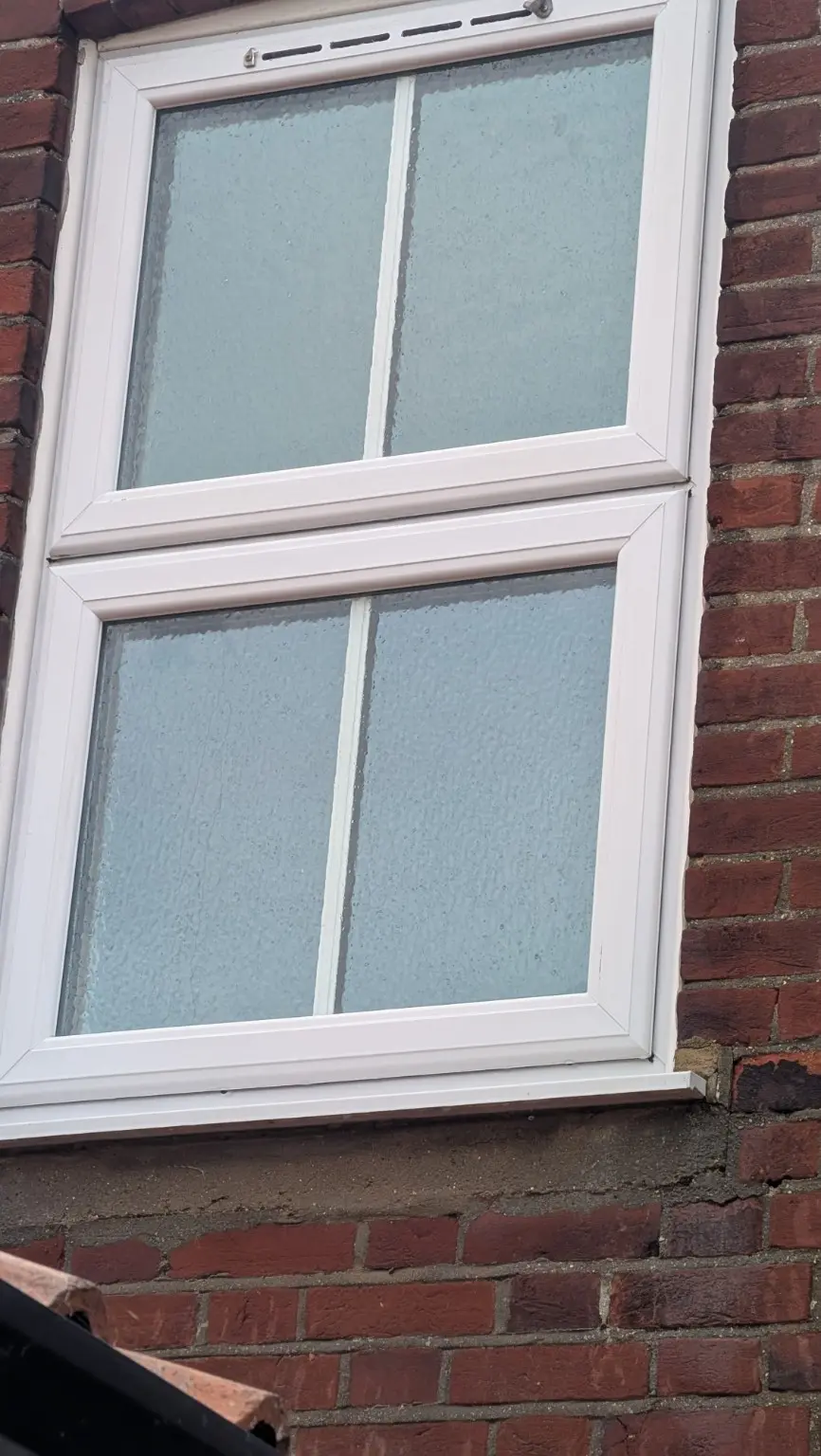Residential window frames and sill after professional cleaning